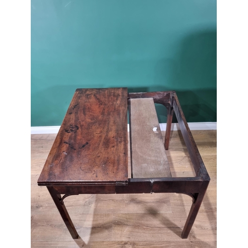 448 - A Georgian mahogany Card Table with foldover rectangular top, supported on a concertina action and r... 