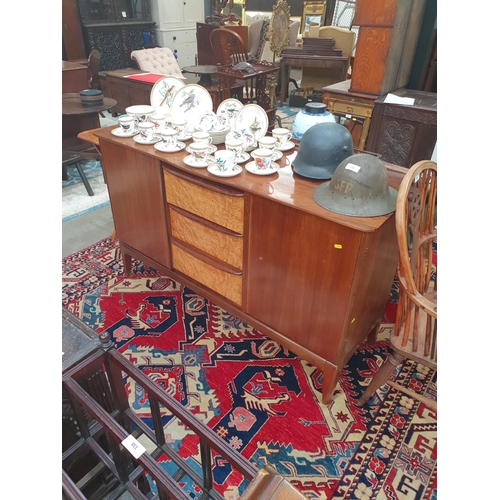 457 - A McIntosh mid Century teak sideboard, fitted three burr maple fronted drawers, flanked by a pair of... 