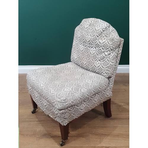 460 - A Howard and Sons low Bedroom/Side Chair with shaped back, upholstered in Howard and Sons ticking, r... 