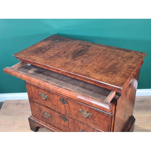 482 - An Early 18th Century Walnut Chest of Drawers, the moulded top above fitted frieze drawer, with thre... 