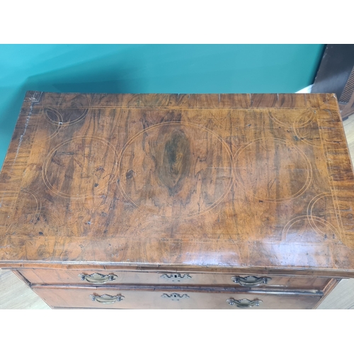 482 - An Early 18th Century Walnut Chest of Drawers, the moulded top above fitted frieze drawer, with thre... 