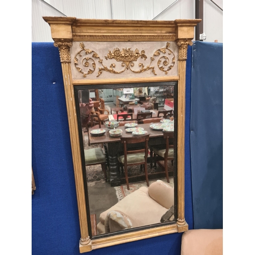 485 - An antique gilt Pier Glass with applied gilt frieze of, a basket of flowers with foliate scrolls, th... 