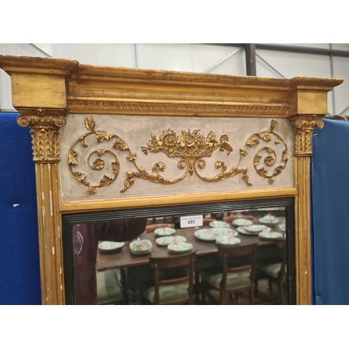 485 - An antique gilt Pier Glass with applied gilt frieze of, a basket of flowers with foliate scrolls, th... 