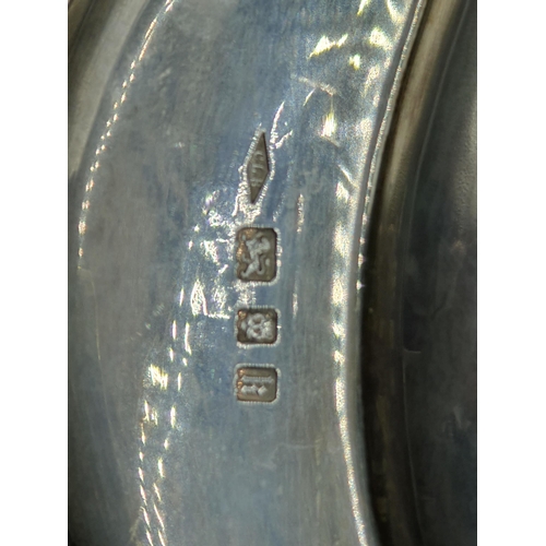 50 - A George V silver large oval Tray with gadroon rim, engraved ornate coat of arms and initials, Londo... 