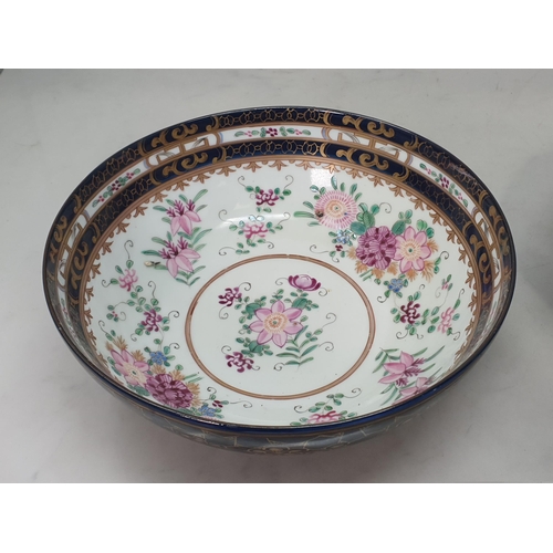 539 - A pair of Samson porcelain Bowls, the outers in blue glaze with elite floral stylez designs, the int... 