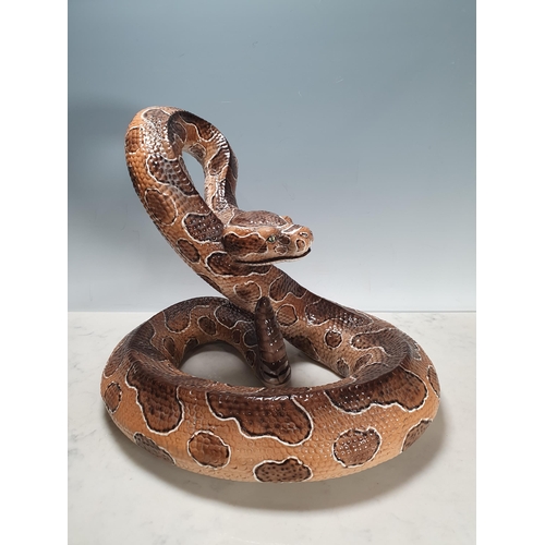 543 - An Italian large ceramic coiled Snake with brown painted details,15in