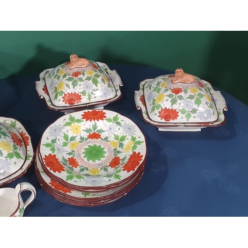 553 - A 19th Century creamware part Dinner Service with over-glaze painted floral design in predominantly ... 