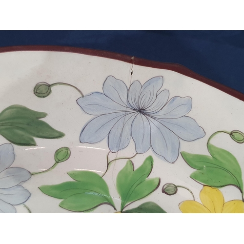 553 - A 19th Century creamware part Dinner Service with over-glaze painted floral design in predominantly ... 