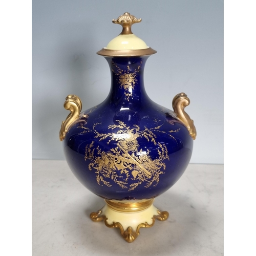 558 - A Coalport two-handled baluster Vase, painted bridge in a landscape, richly gilt, lid and feet resto... 