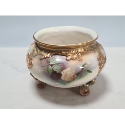 581 - A Royal Worcester Bowl on three scroll feet, painted floral design, No. 183, and a Vase with fluted ... 