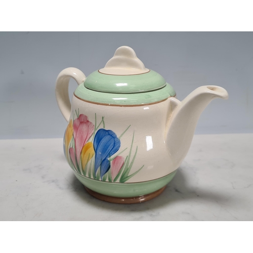 583 - A Clarice Cliff lidded Honey Pot, Teapot, small Trinket Dish and Jam Pot, (missing lid), all 'Crocus... 