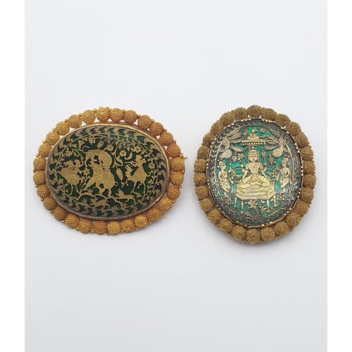 166 - Two 19th century Indian Thewa Pratapgarh Brooches one depicting Shiva (50 x 43mm), the other a hunti... 