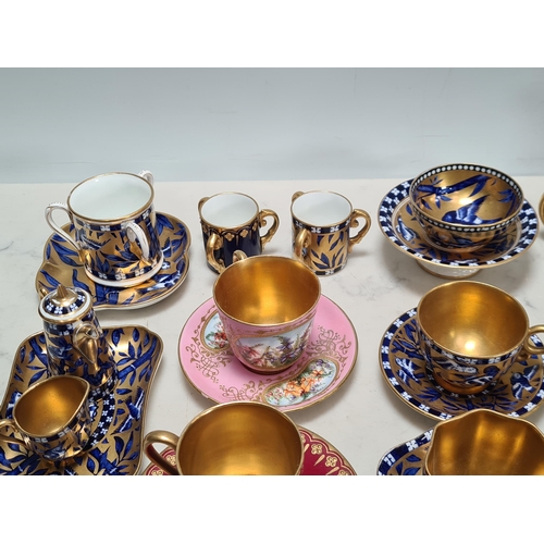 586 - A collection of Coalport miniature Coffee Pots, Saucers, Dishes, Bowls and Vases, chiefly blue and g... 