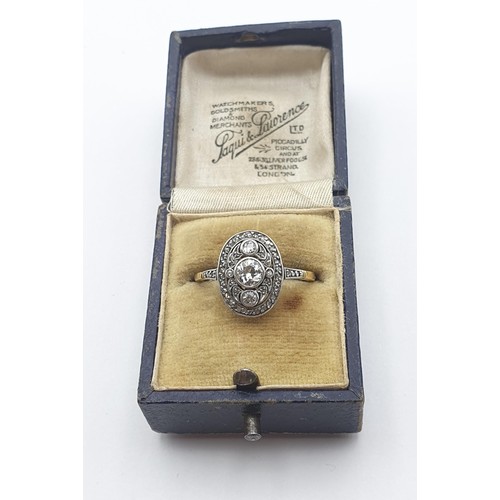 168 - An Art Deco Diamond Panel Ring, central millegrain-set old cut diamond with two smaller millegrain-s... 