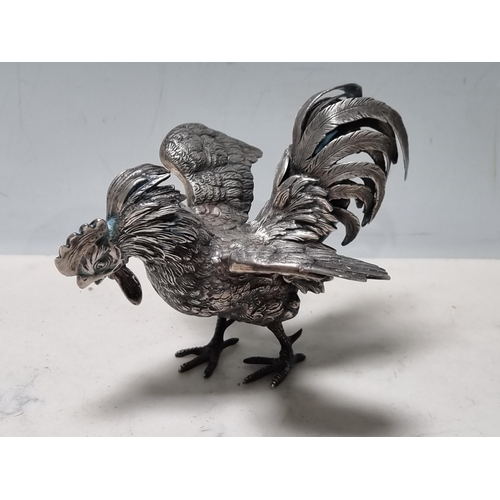 61 - A Continental silver Figure of a cockerel with finely detailed plumage and detachable head, 5in