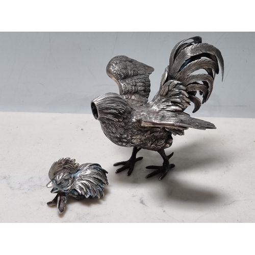 61 - A Continental silver Figure of a cockerel with finely detailed plumage and detachable head, 5in