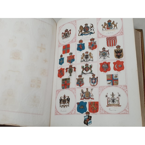 635 - Two gilt tooled leather Albums containing a collection of Coats of Arms.