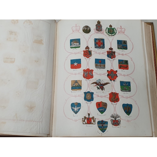 635 - Two gilt tooled leather Albums containing a collection of Coats of Arms.