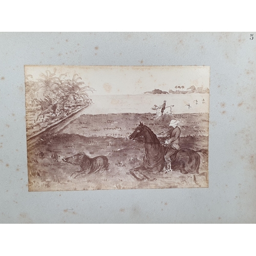 641 - An Album containing a collection of eleven pen and wash Paintings of Pig Hunting in Imperial India.