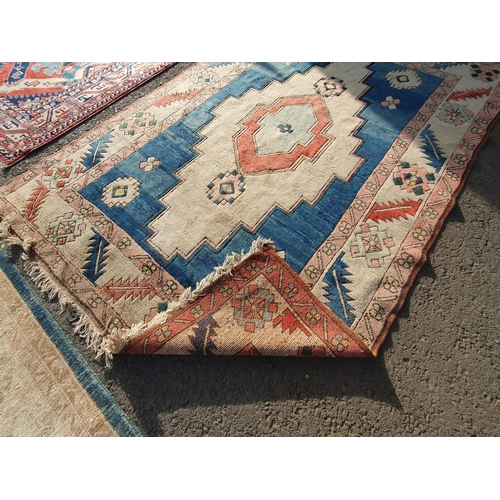 659 - An Ushak type bordered Carpet, the central field with cream stepped medallion with blue surround, ma... 