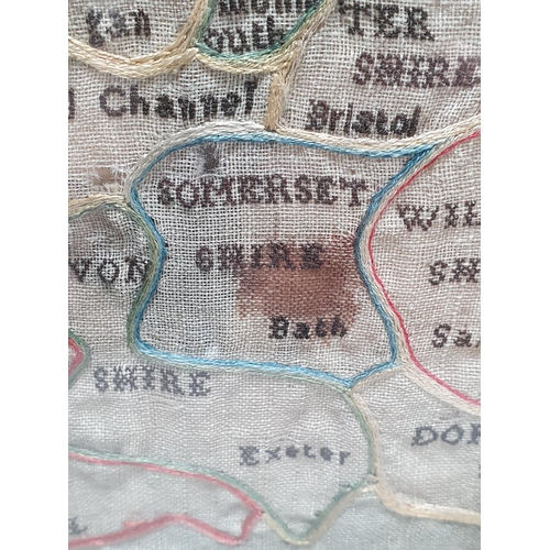 669 - A 19th Century silk needlework Sampler 'A Map of England and Wales with trailing border intertwined ... 