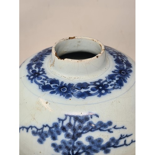 548 - A 17th Century delftware Meiping type Vase, in blue and white glaze, with Oriental landscape with fi... 