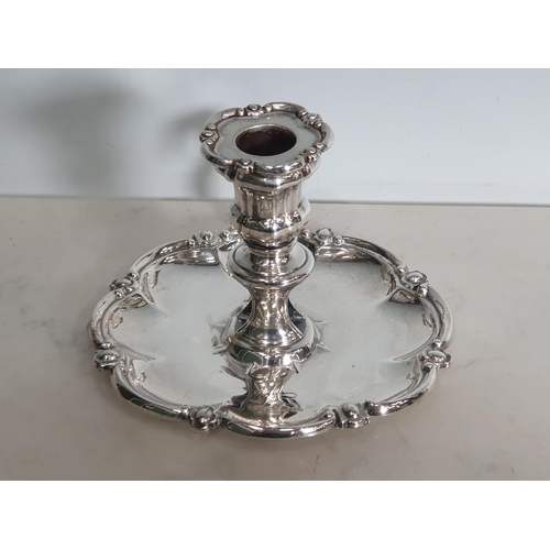 68 - A George IV silver Chamber Candlestick engraved crest, shaped rim, Sheffield 1824, maker: J & T Sett... 