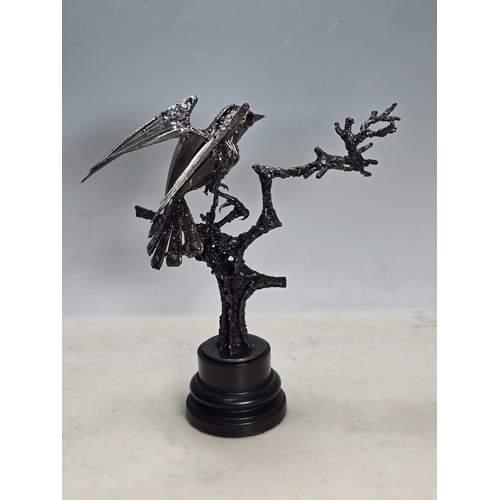 687 - WALENTY PYTEL, a metal Sculpture of a Passerine bird (possibly a Flycatcher), on a branch, 11 1/2in ... 