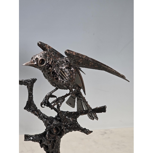 687 - WALENTY PYTEL, a metal Sculpture of a Passerine bird (possibly a Flycatcher), on a branch, 11 1/2in ... 