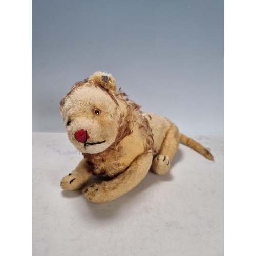 689 - A Steiff Papa Lion 1ft L, a Steiff Lioness 8.5