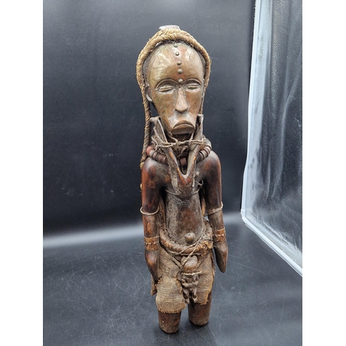 693 - Two West African carved Figures with applied nails, 22in H.