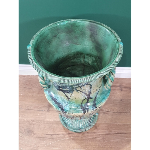 716 - A large ceramic two handled campagna Urn Vase with green marbled design by Marion Brandis, 2ft high,... 