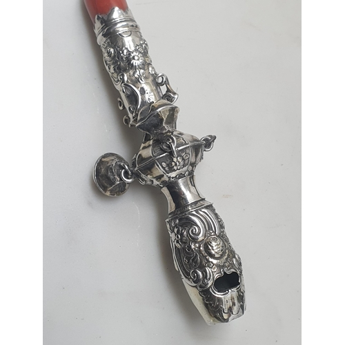 72 - A silver Rattle with floral embossing and two bells, others missing, engraved initials C.D