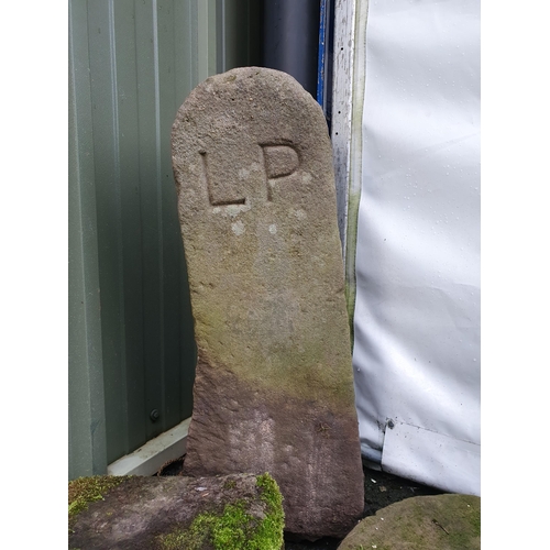 723 - A carved stone Place/Mile Marker, bearing the initials 'L.P', 2ft 7in H, a small circular Mill Stone... 