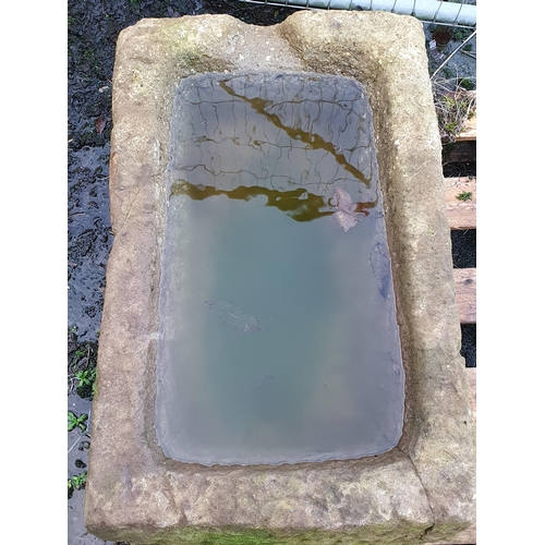 724 - A heavy carved shallow Stone Trough/Drinker, 17in H x 2ft 4in L x 17in Deep