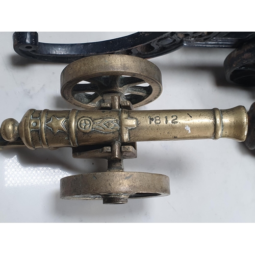 775 - A pair of antique brass barreled Desk Canons 17in L, another cast iron Desk Canon 11 1/2in L and ano... 