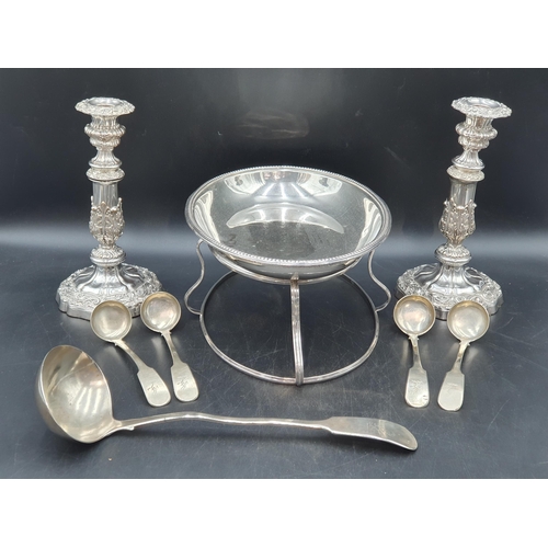 79 - A pair of 19th century Sheffield plated Candlesticks with leafage columns, shaped circular bases, 9i... 