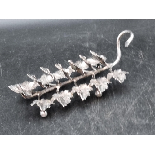 93 - An unusual plated Toastrack with leafage divisions and twig handle