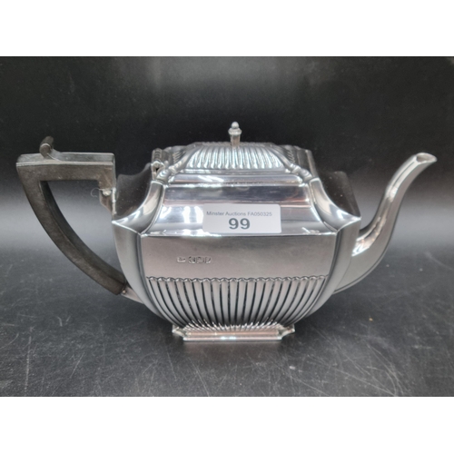 99 - A Victorian silver Teapot of oblong semi-fluted form with ebonised handle, Sheffield 1892, maker: H.... 