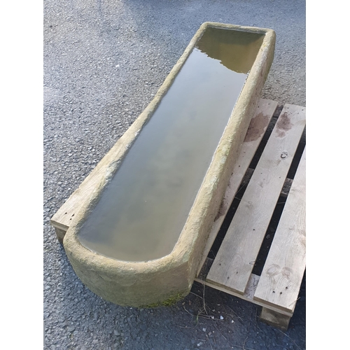 722 - A rectangular carved Stone Trough, one end arched, the other square, 6ft 1in L x 18in W x 8 1/2in H