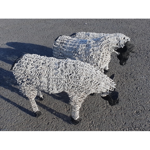 704 - Three black and white beadwork Sheep, 2ft