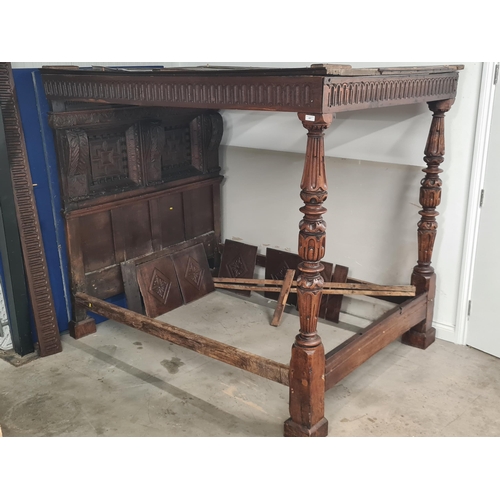 387 - A 17th century and later oak Four Poster Bed  with panelled headboard flanked by leafage carved pila... 