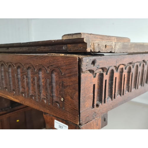 387 - A 17th century and later oak Four Poster Bed  with panelled headboard flanked by leafage carved pila... 