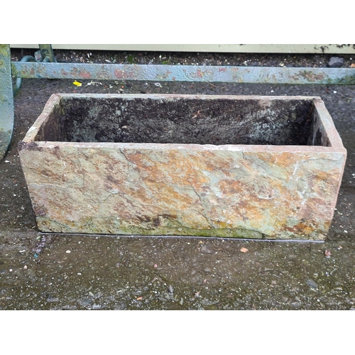 731 - A small Stone Trough and a cast iron Gutter Head