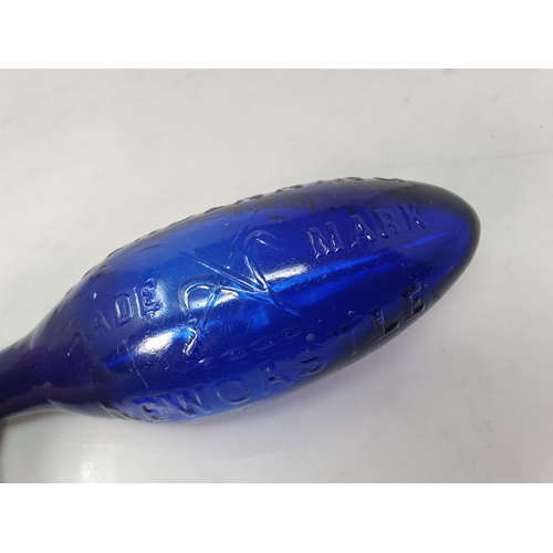 536 - A blue glass torpedo shape Fire Extinguisher by Glendenning Newcastle, 9in