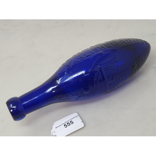 555 - A blue glass torpedo shape Fire Extinguisher by G Eland's Potass Water, Cross Street, Westgate Road,... 