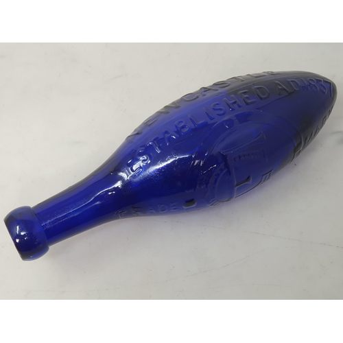 555 - A blue glass torpedo shape Fire Extinguisher by G Eland's Potass Water, Cross Street, Westgate Road,... 