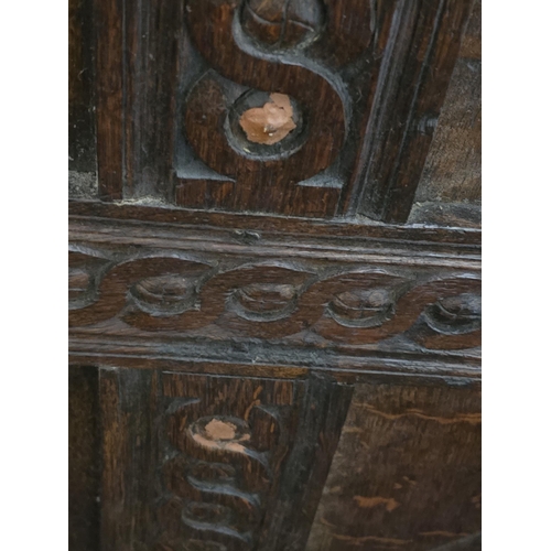 387 - A 17th century and later oak Four Poster Bed  with panelled headboard flanked by leafage carved pila... 