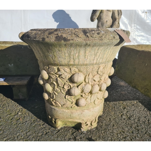 706 - A circular composition Garden Urn moulded fruit