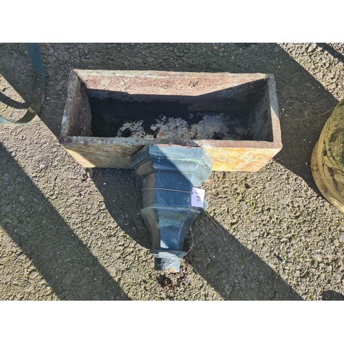 731 - A small Stone Trough and a cast iron Gutter Head